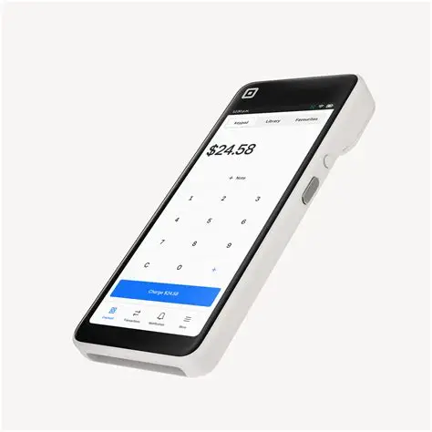 Square Handheld device at an angle showing a charge amount on screen
